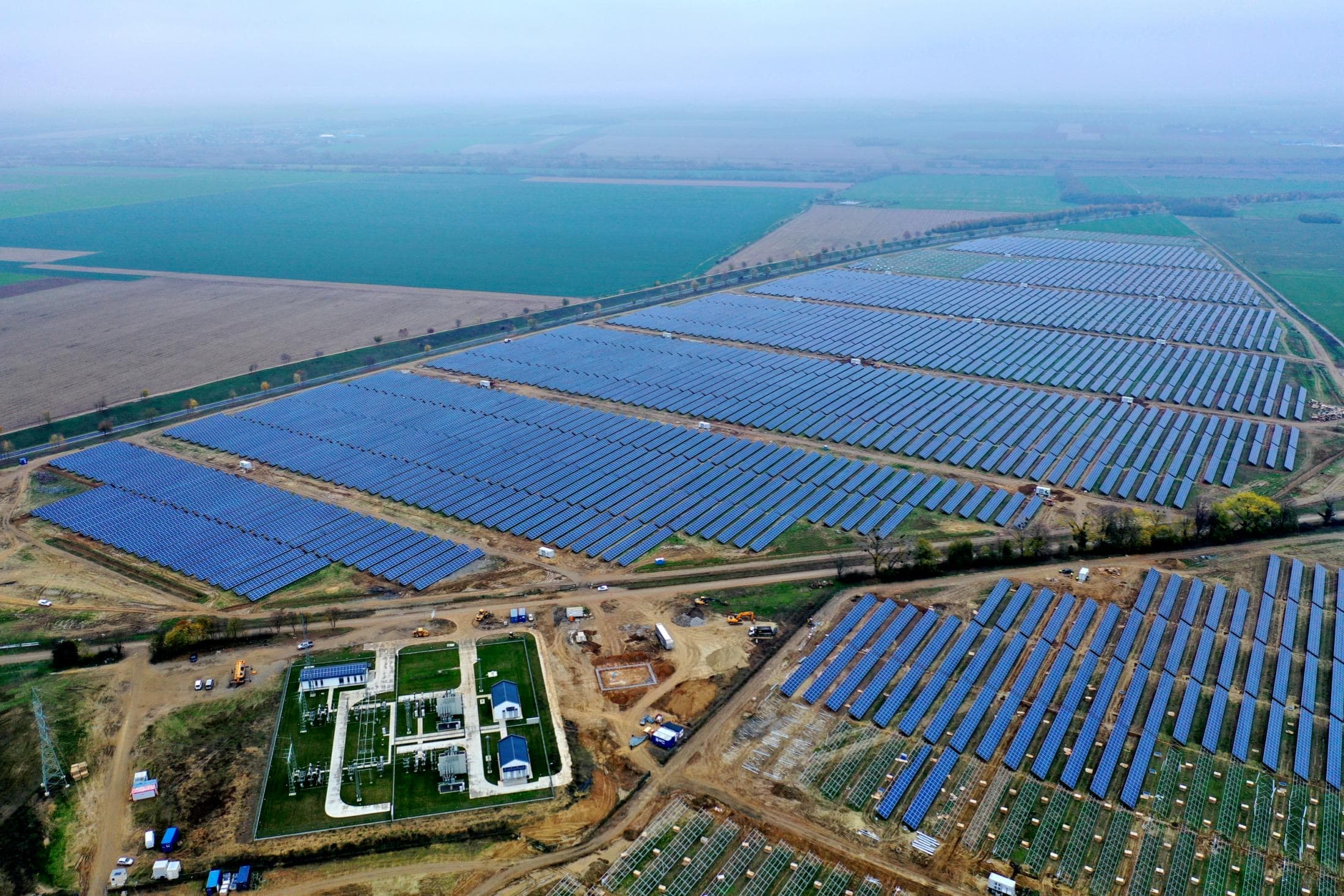 Utility-scale solar project visual linked to infrastructure delivery.